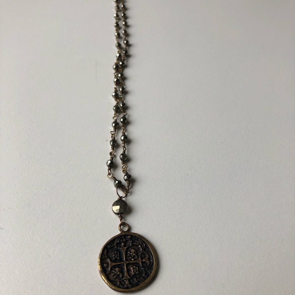 Gray beaded necklace with coin